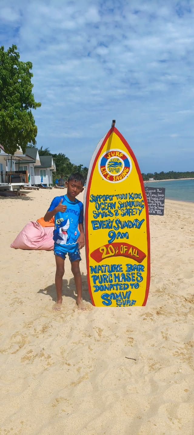 Surf Club child at the beach