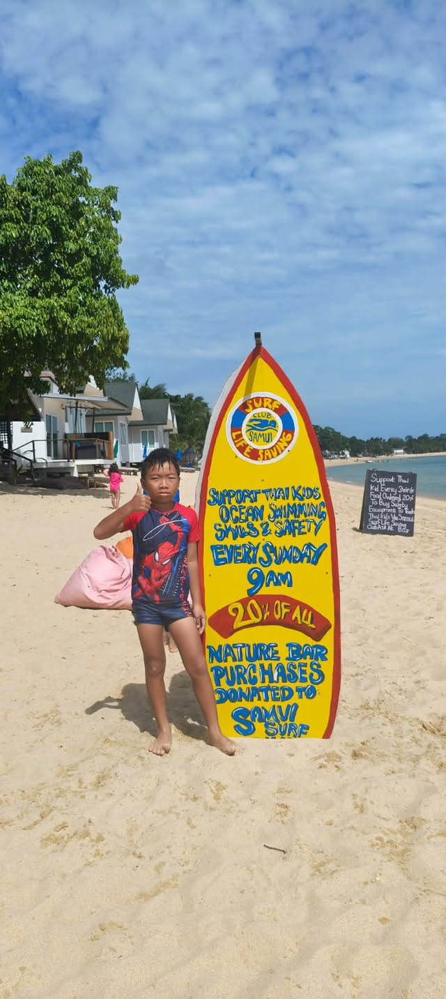 Surf Club child at the beach