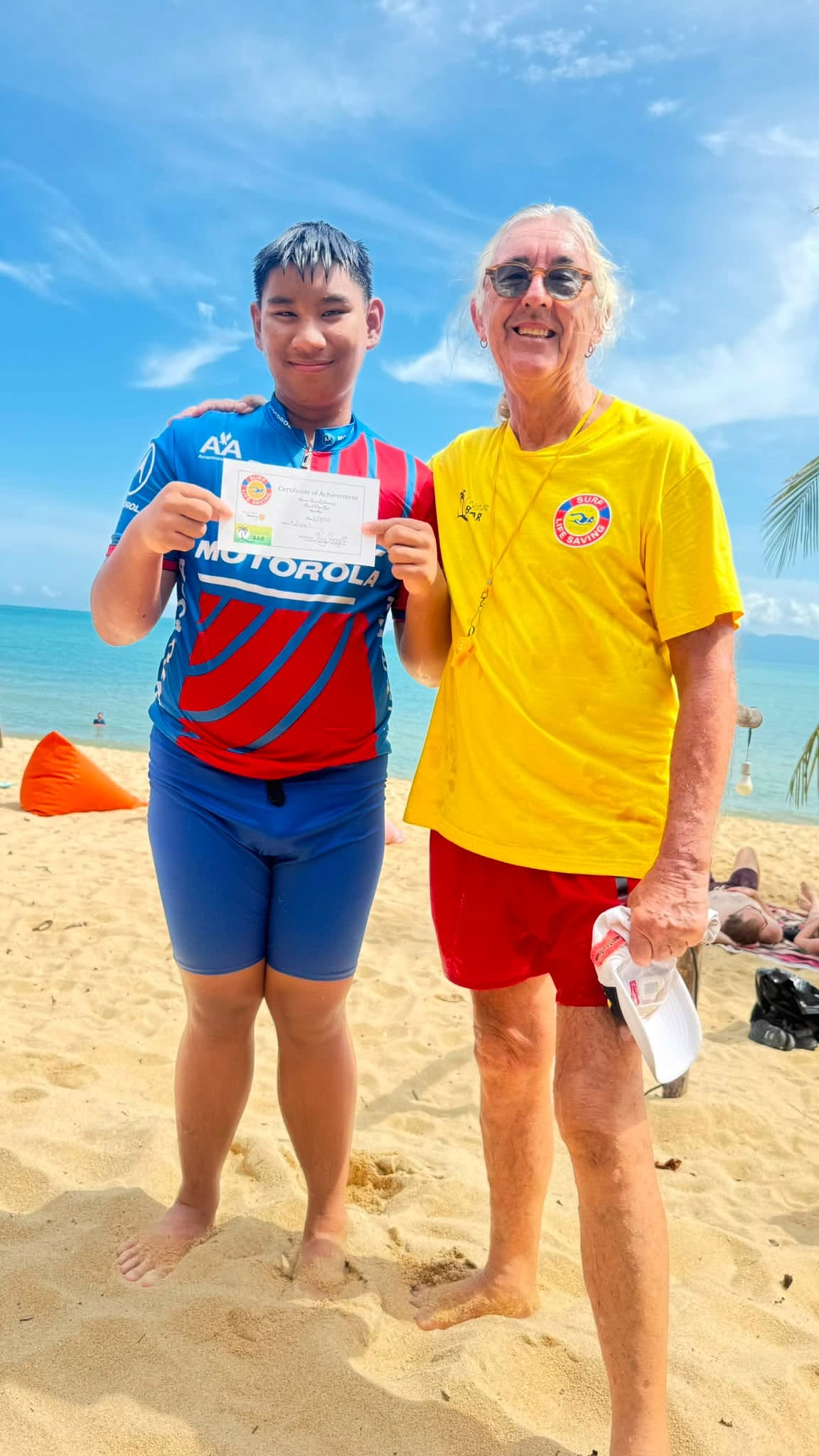 Pete, The Doc, with Poohpa and his swimming certificate